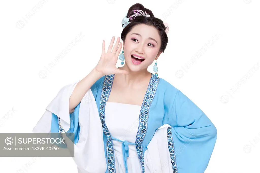 Young woman in Chinese traditional costume shouting