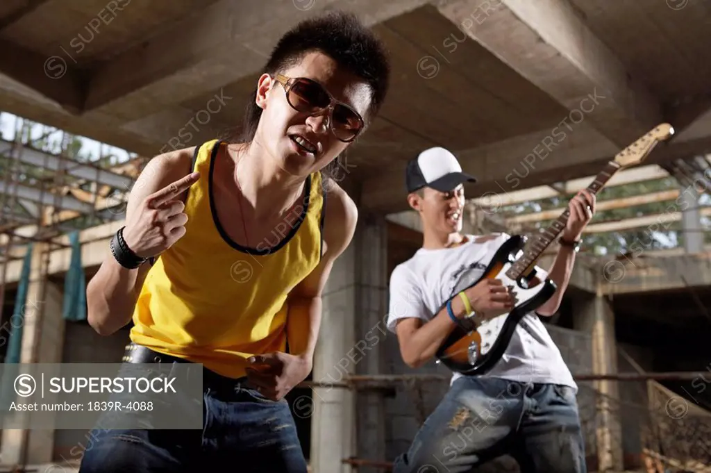 Young Men Playing Rock Music