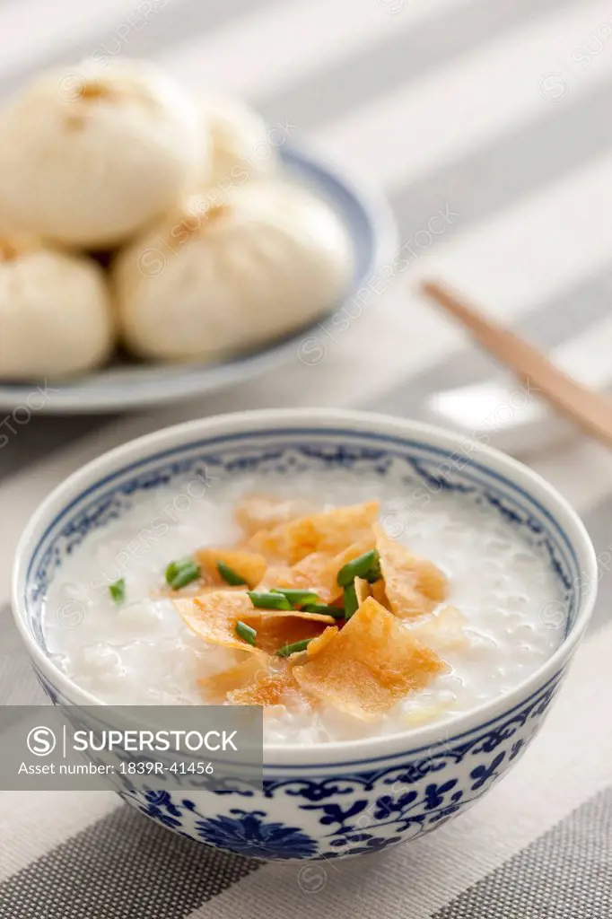 Chinese food rice porridge and steamed buns