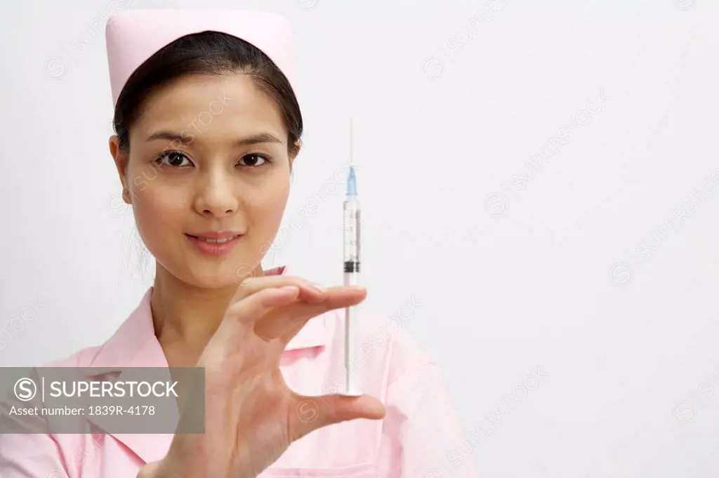 Nurse Holding Syringe