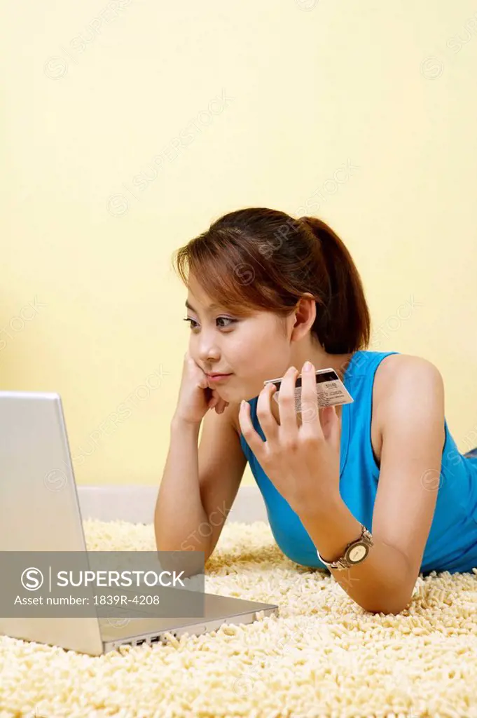 Young Woman With A Computer