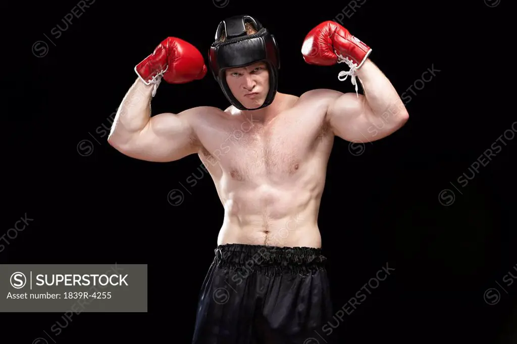 Boxer Flexing Muscles