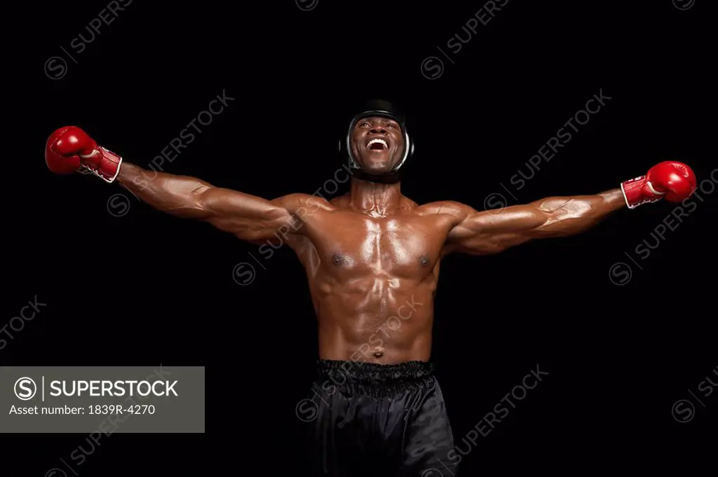 Boxer With Arms Outstretched Celebrating Victory