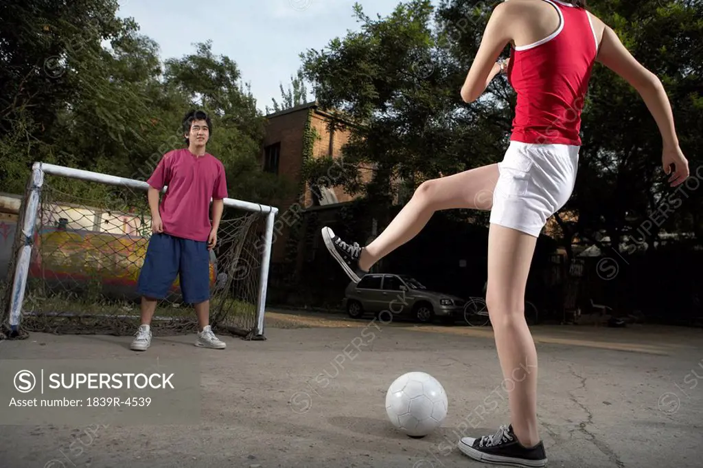 Teenagers Playing Soccer