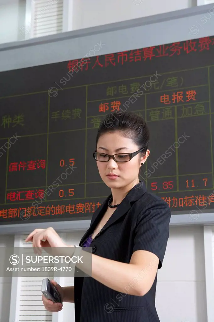 Businesswoman Checking Her Watch