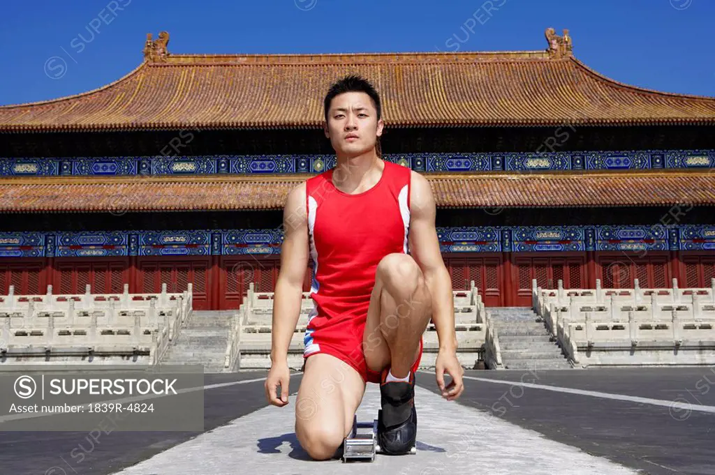 Portrait Of Athlete In Front Of Temple