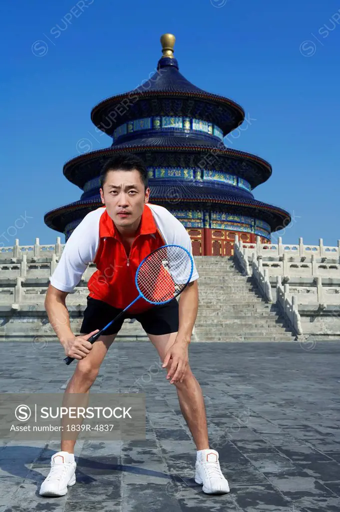 Portrait Of Badminton Player In Front Of Temple