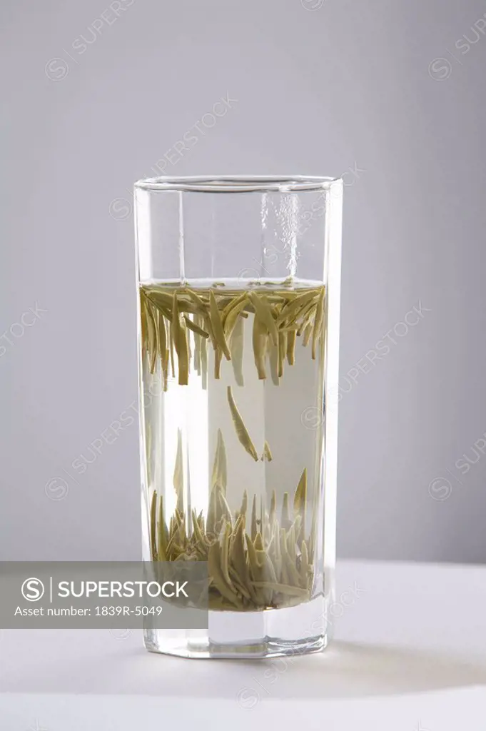 Glass Containing Tea Leaves