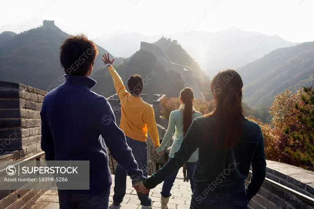 Two Young Couples Visit The Great Wall Of China