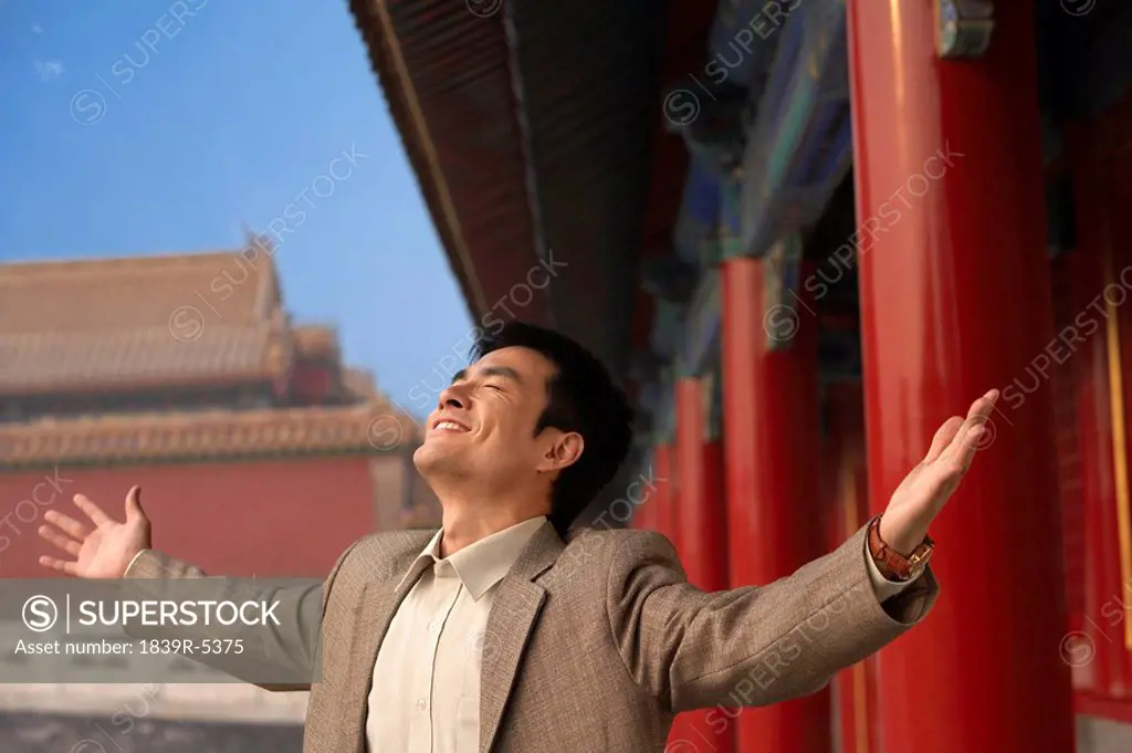 Businessman Celebrates At The Forbidden City