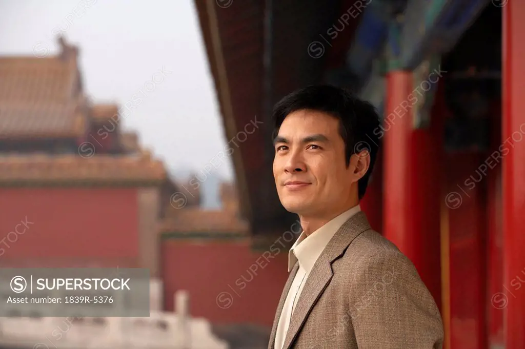 Businessman Standing At The Forbidden City