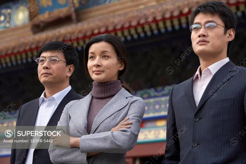 Three Business People In The Forbidden City In Beijing