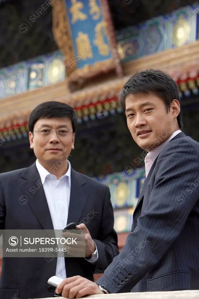 Two Businessmen In The Forbidden City In Beijing