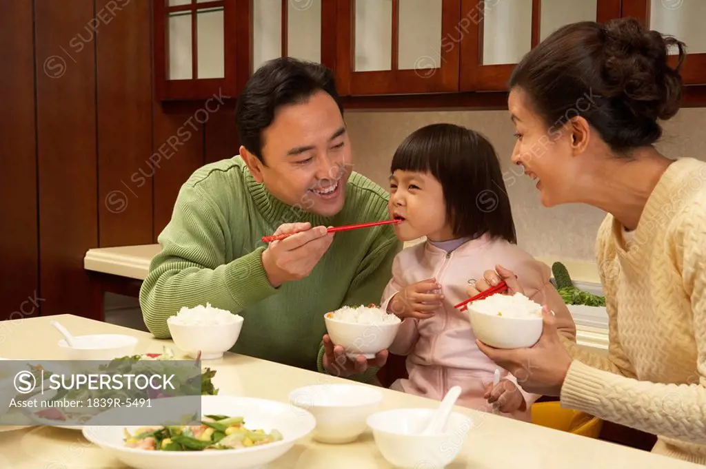 Family eating dinner together