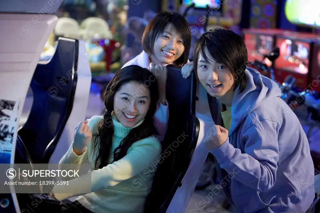 Teenagers Posing At Arcade