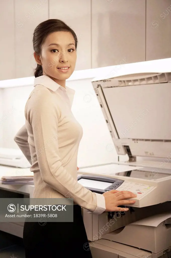 Young Woman Photocopying