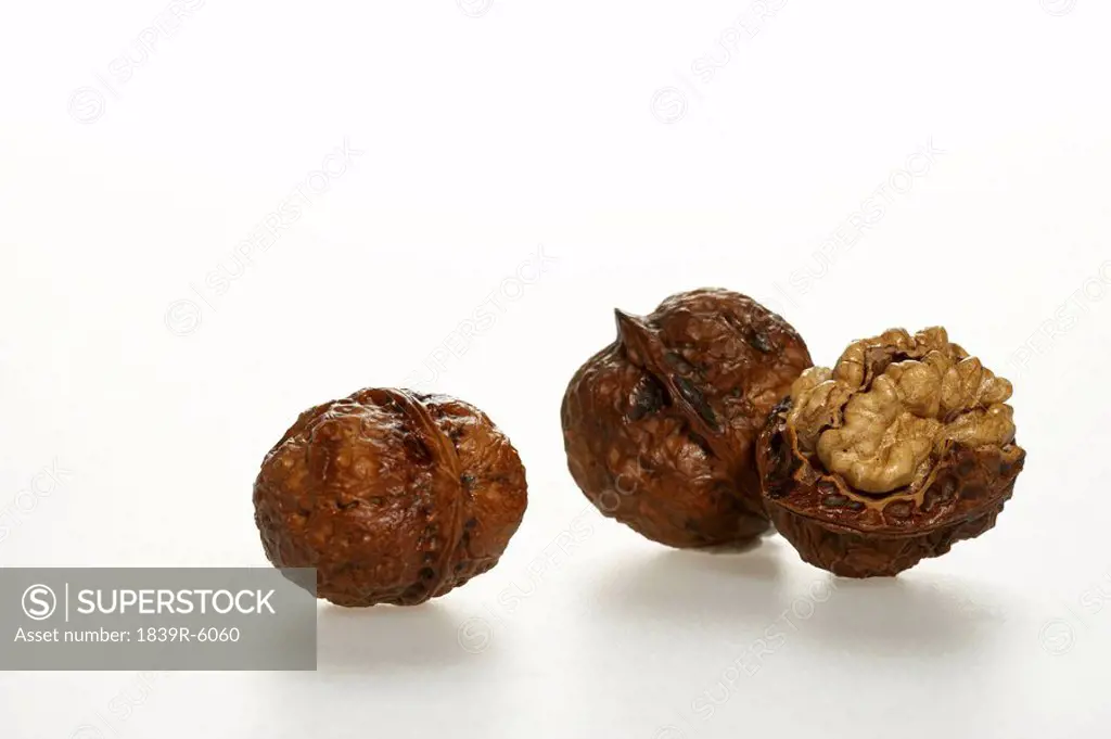 Whole and opened walnuts