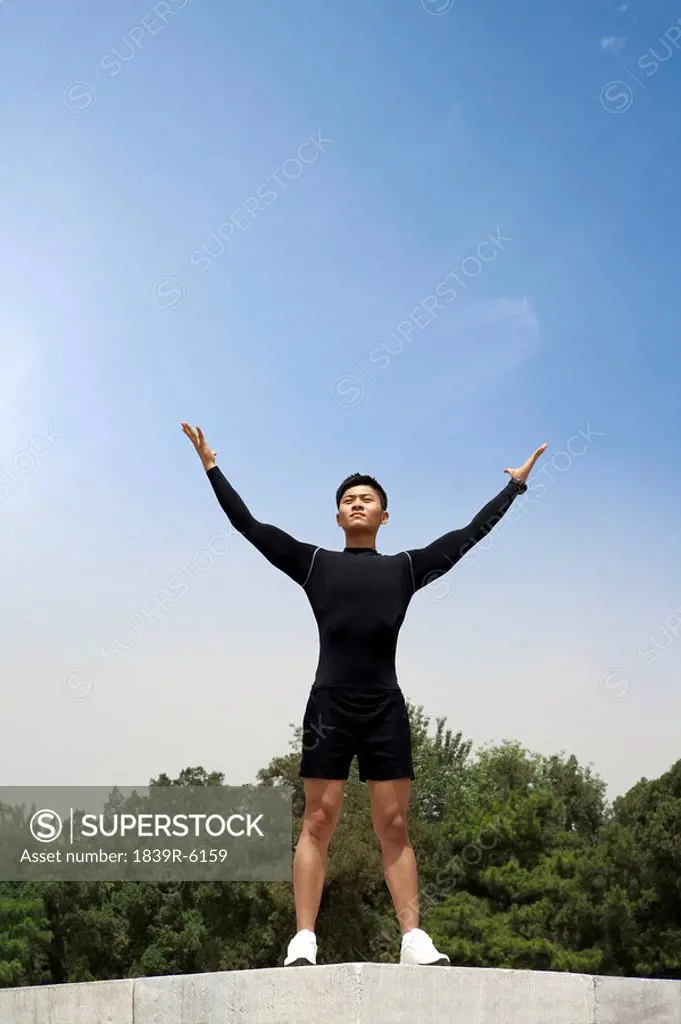 Athlete With His Arms Raised