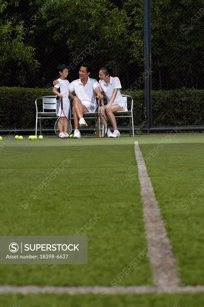 A one child family on the tennis court