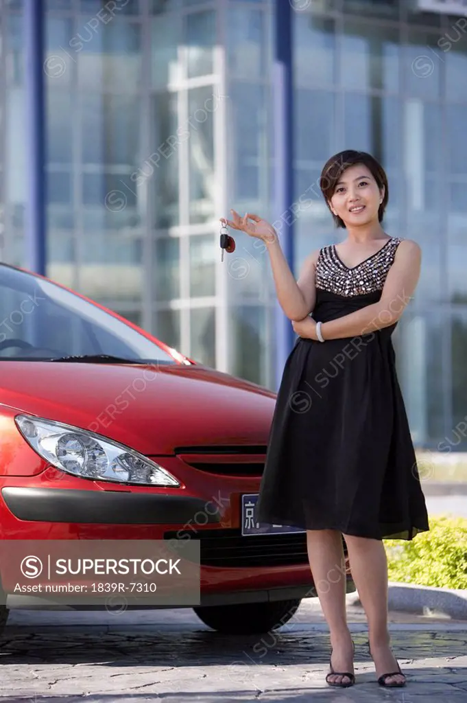 Woman with a new car