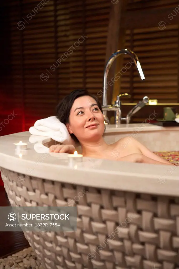 Woman relaxing in an aromatherapy bath