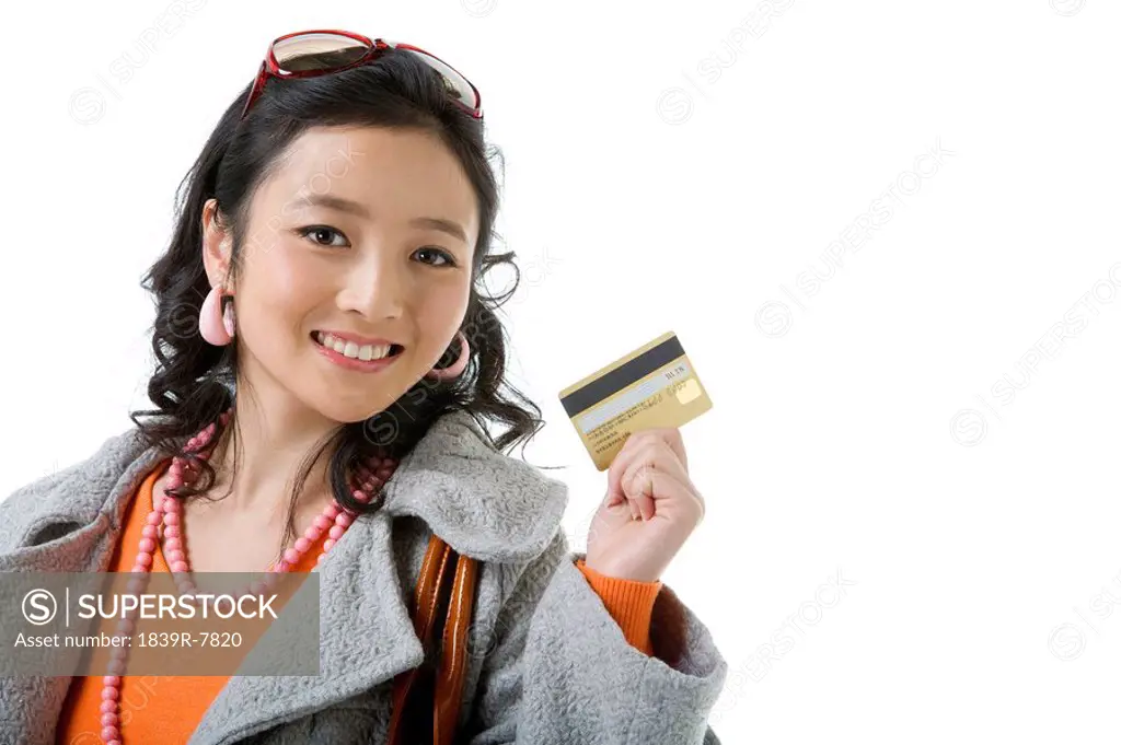 Young woman with credit card