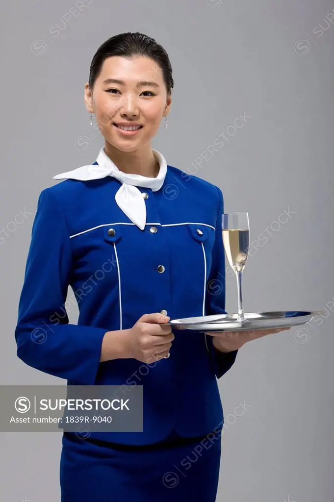 Flight Attendant Serving Champange