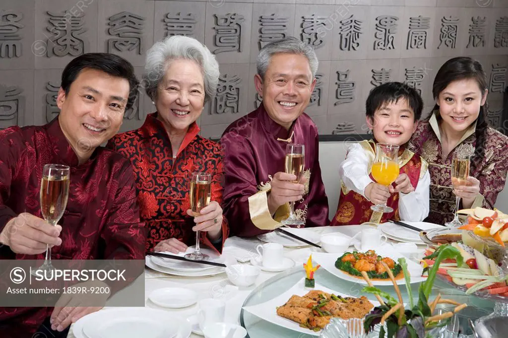 Chinese family celebrating at Chinese restaurant