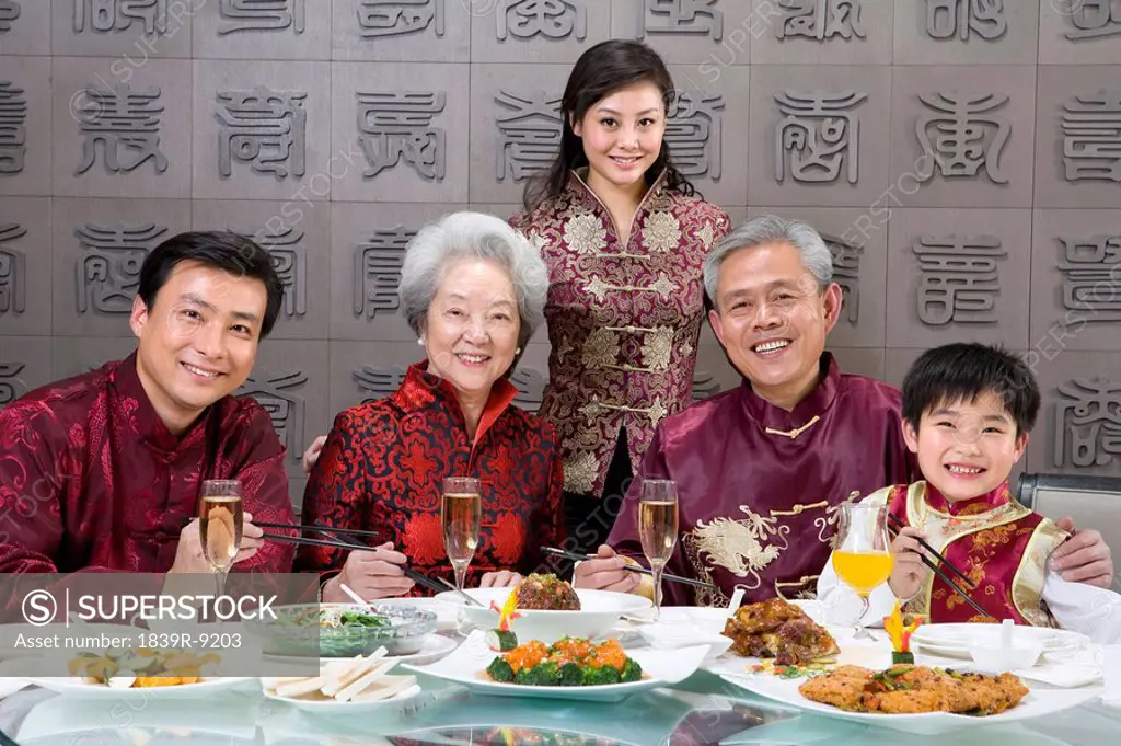 Chinese family celebrating at Chinese restaurant