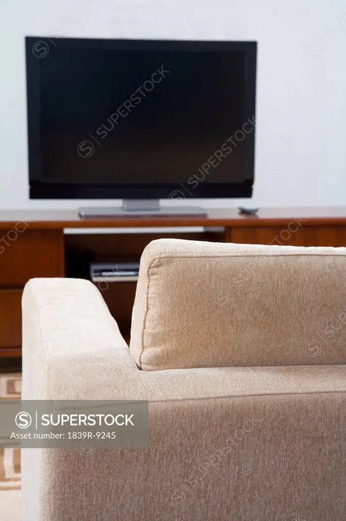 Widescreeen television and couch
