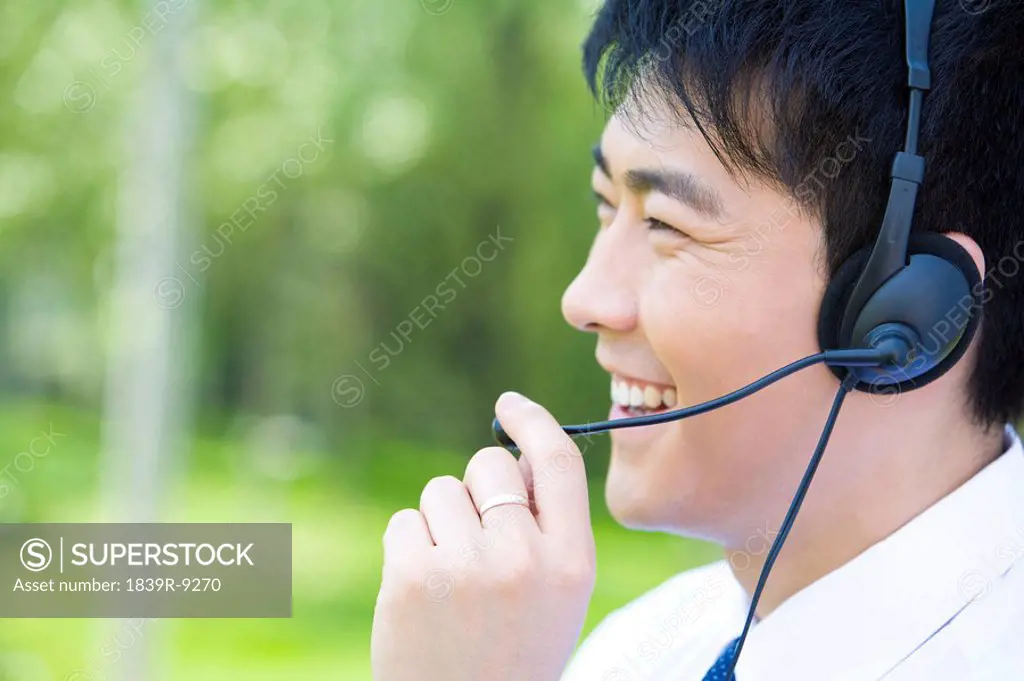 Asian man with headset