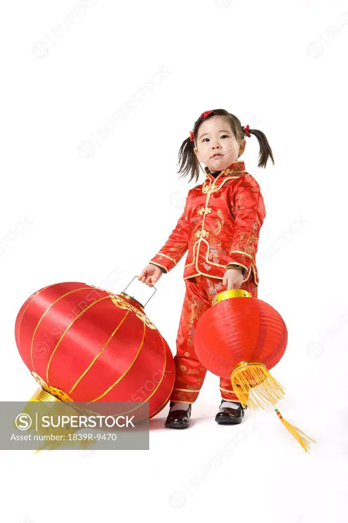 Young girl with Chinese traditional red lantern