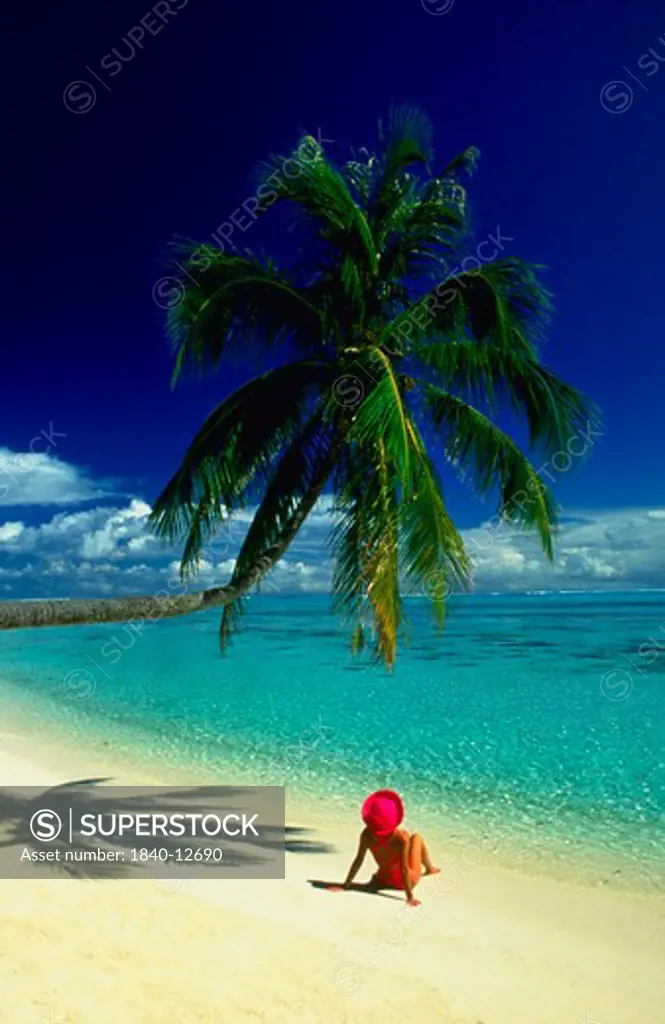 Woman on Matira Beach, Bora Bora, Society Islands, French Polynesia.