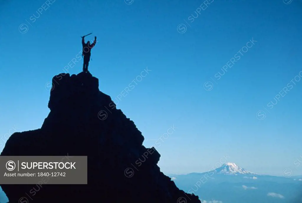Mountain climber on peak
