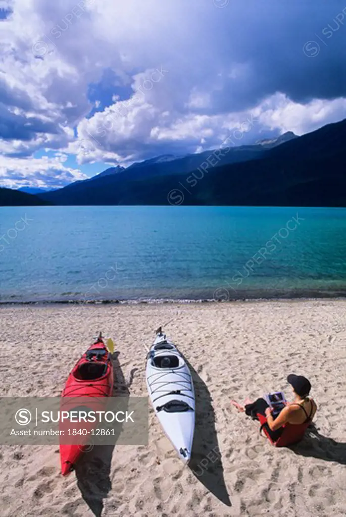 Kayak camp on Rainbow Falls Beach on Azure Lake in Wells Gray Provincial Park, British Columbia, Canada.