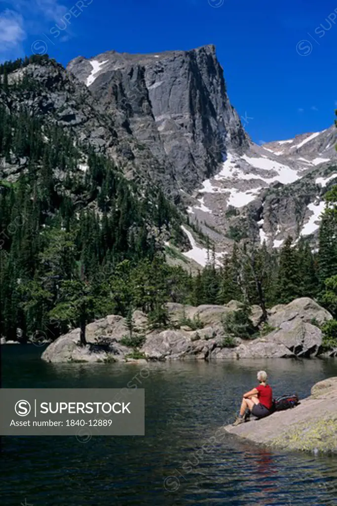 The granite peaks of Tyndall Gorge rise above Dream Lake in Rocky Mountain National Park, Colorado.