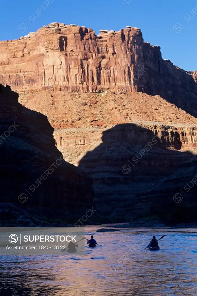 Kayaking the San Juan River upstream of Slickhorn Canyon, Glen Canyon National Recreation Area, Utah.