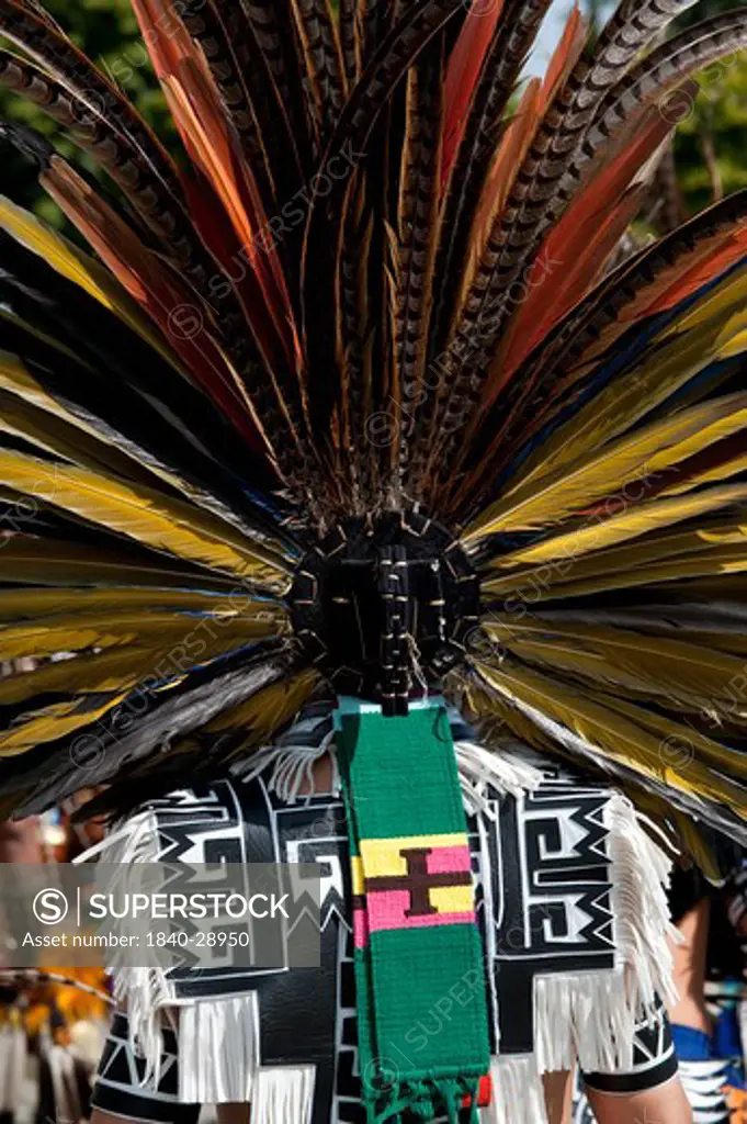 Headdress of Aztec Indian Dancer getting ready to do an Indian dance ceremony at the Evergreen State Fair Monroe Washington State USA