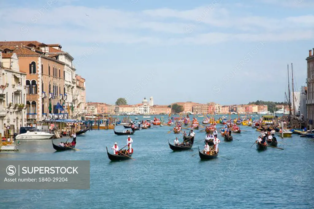 Gondolas lead the procession on the  Grand Canal in Venice for the Historical Regatta which takes place each September.