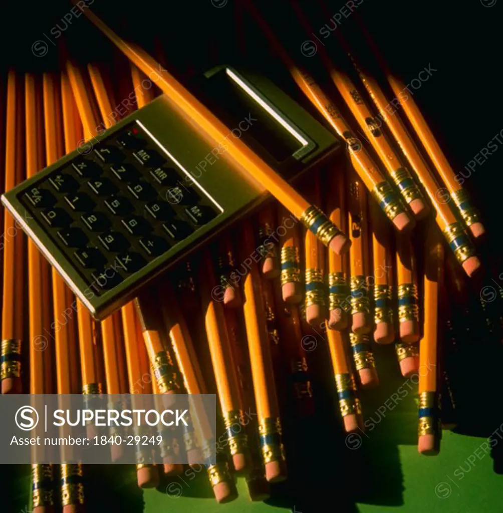 Yellow pencils and calculator