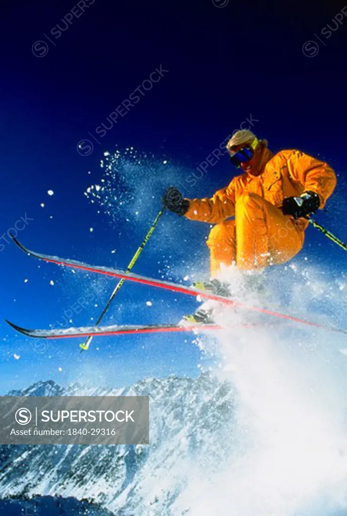 Skiing at Snowbird Ski Resort in Utah near Salt Lake City. We have huge files of ski photography from many of the Utah ski resorts including Deer Valley, Park City, Alta, Snowbird, Solitude and Sundance.