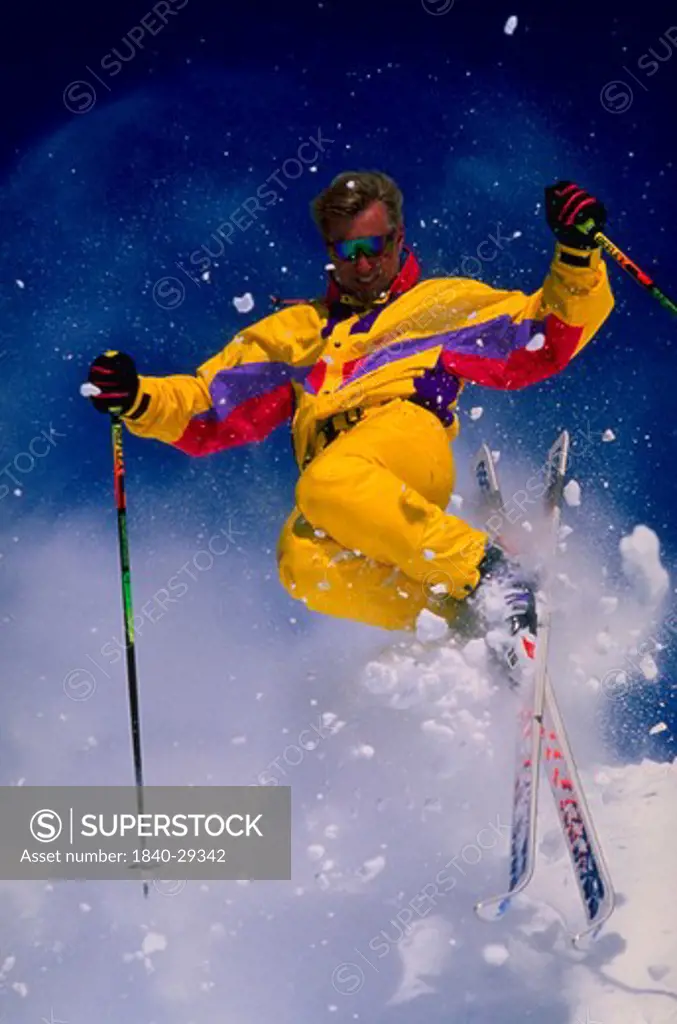 Copyright James Kay.  Skier on the slopes of Snowbird Ski Resort in the Wasatch Mountains near Salt Lake City, Utah.  We have very large, comprehensive files of action ski photography from Utah and from other areas around the world including New Zealand, Canada, the Himalayas, and Europe.