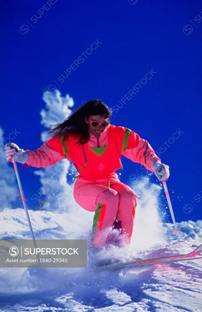 Copyright James Kay.  Skier on the slopes of Snowbird Ski Resort in the Wasatch Mountains near Salt Lake City, Utah.  We have very large, comprehensive files of action ski photography from Utah and from other areas around the world including New Zealand, Canada, the Himalayas, and Europe.