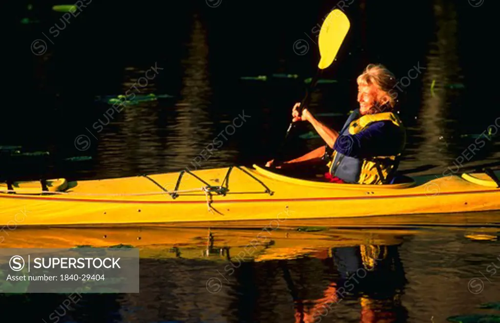 Senior woman kayaking, Utah