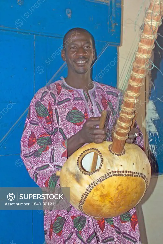 Albreda, Gambian Muscian Playing The Kora