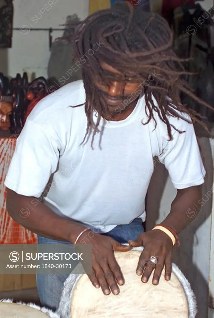 Gambia, Drummer On Market Stall
