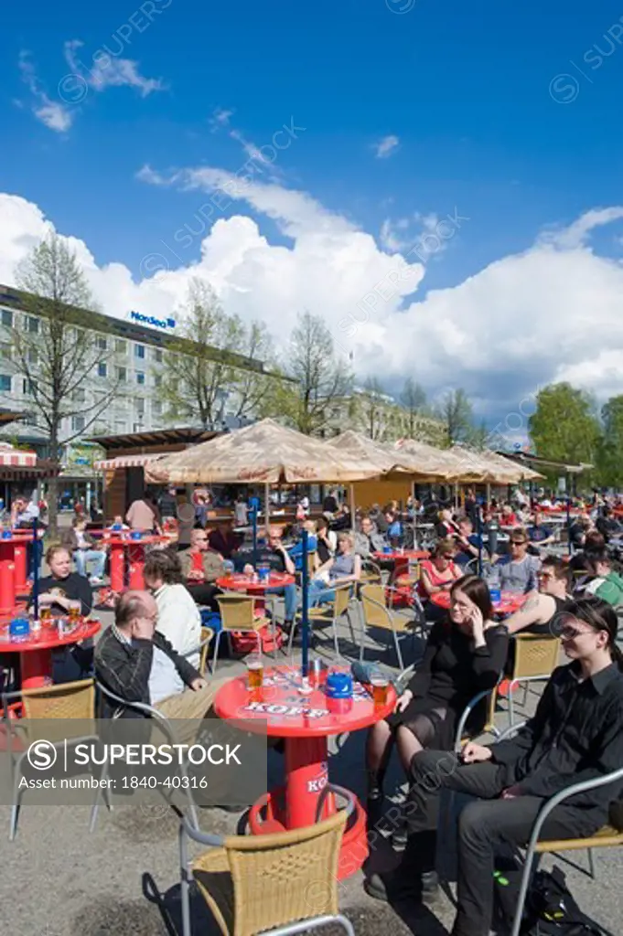 People relaxing in bars on Main Square, Joensuu, Karelia, Finland