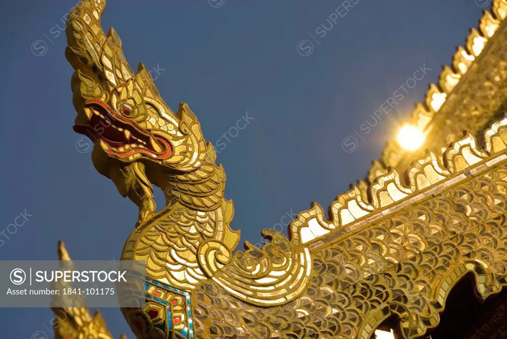 Dragon figure at the roof of the Temple Wat Phra Singh, Chiang Mai, Thailand, detail