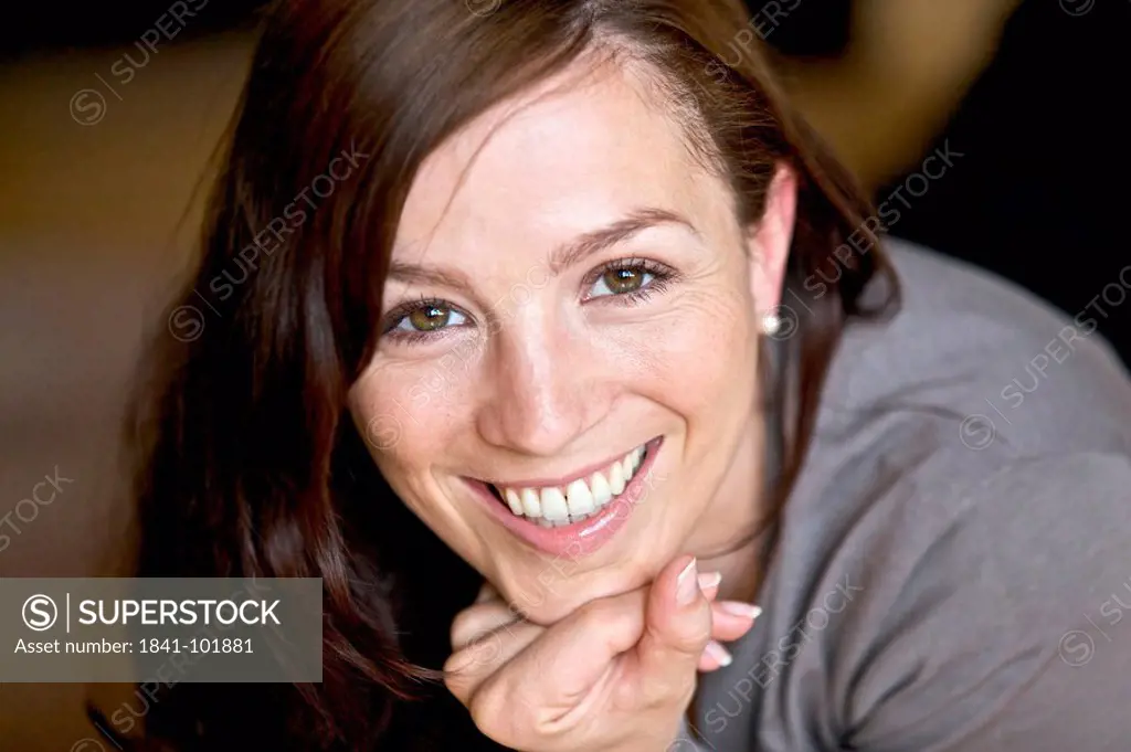 Smiling brunette woman, portrait