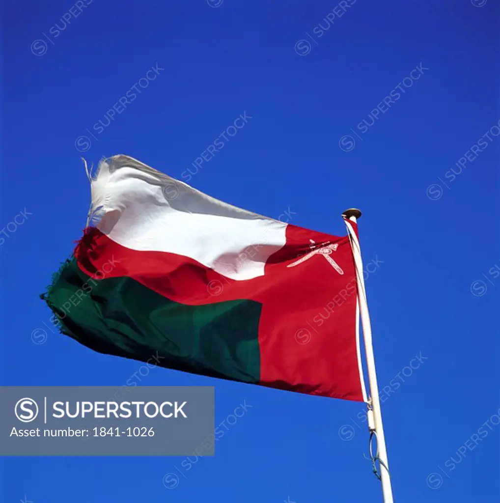 Low angle view of flag of Oman